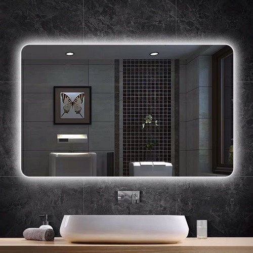 Frameless backlit bathroom mirror